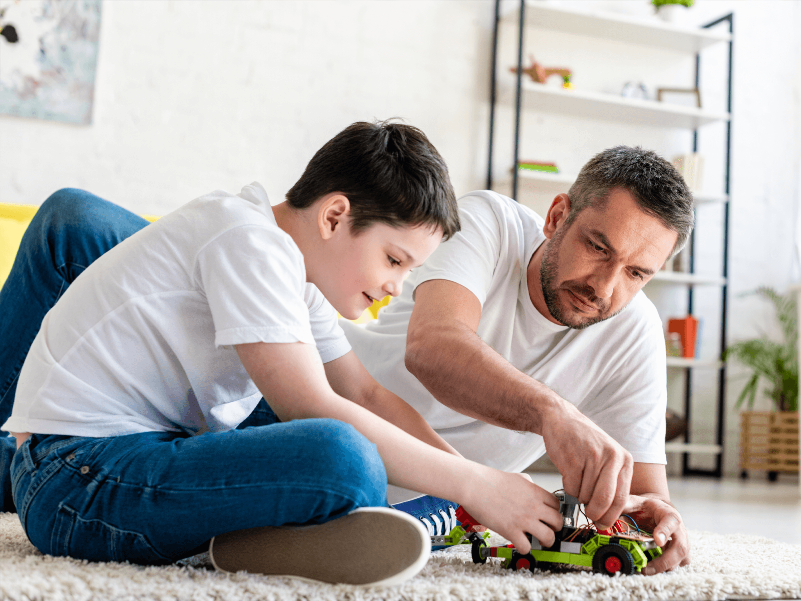 Parent and child building skills together