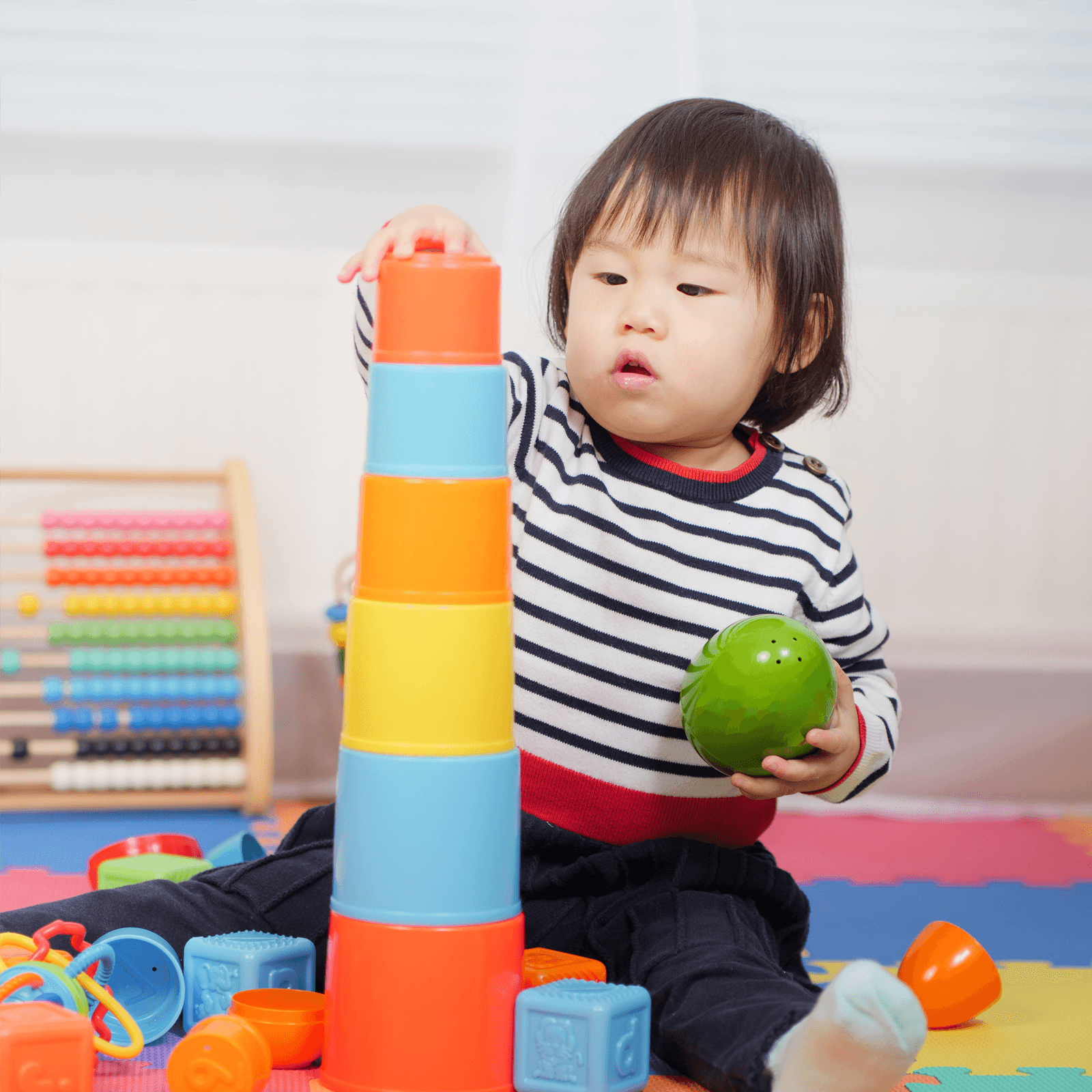 Therapist supporting a school-age child