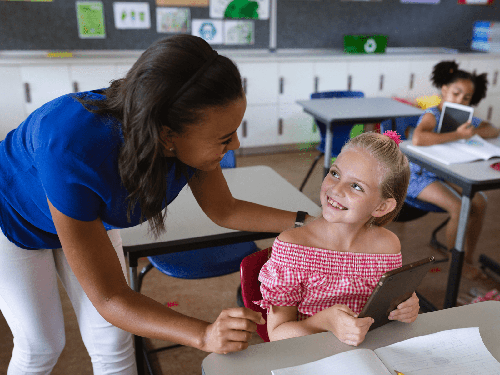 Behavior technician providing classroom support