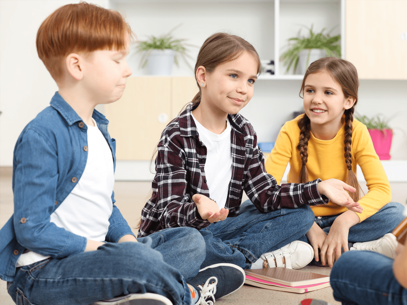 Children building friendships through social skills training